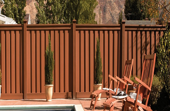 Trex composite fences are a great wood alternative. Even next to a pool this is a maintenance free fence