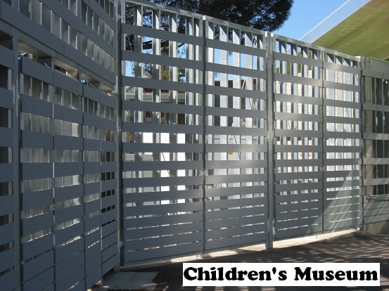 This custom fence and gates were installed at the Children's Museum in Los Angeles. The slats are Trex boards