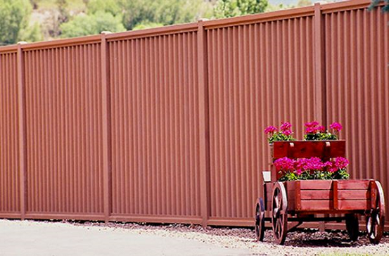 Corrugated steel privacy fencing is perfect for commercial fence needs