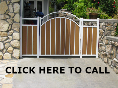 This is a white wrought iron gate with wood inlays
