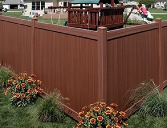 Wood grain vinyl fencing for your homes privacy needs